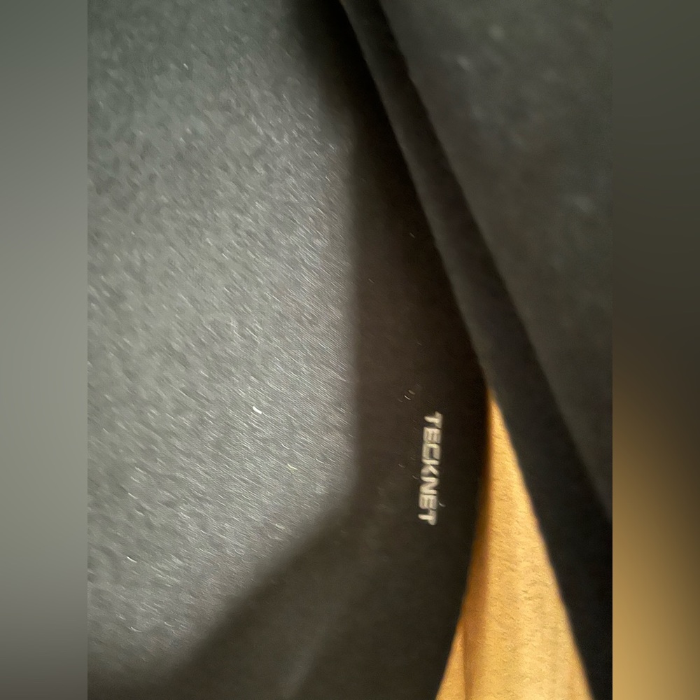 Mouse pad with wrist support.